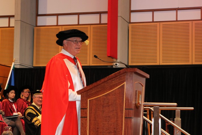 Noel Wagg delivering the occasional address at the ceremony