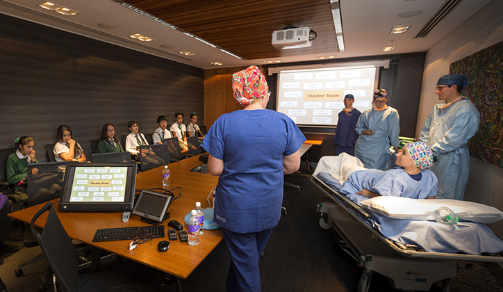  Students from Marsden High School watch an operating theatre demonstration.