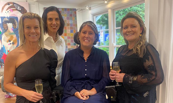 Group of four people at the PartyOn event
