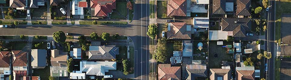 Arial view of a suburban area showing housing and roads 