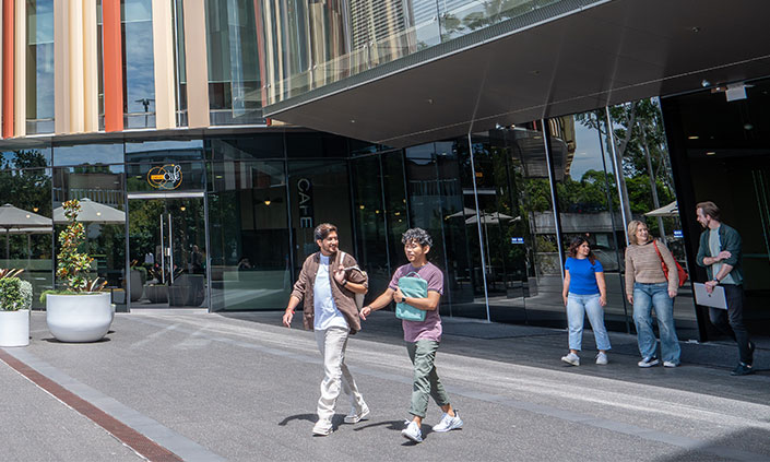 Students in front of Macquarie Library