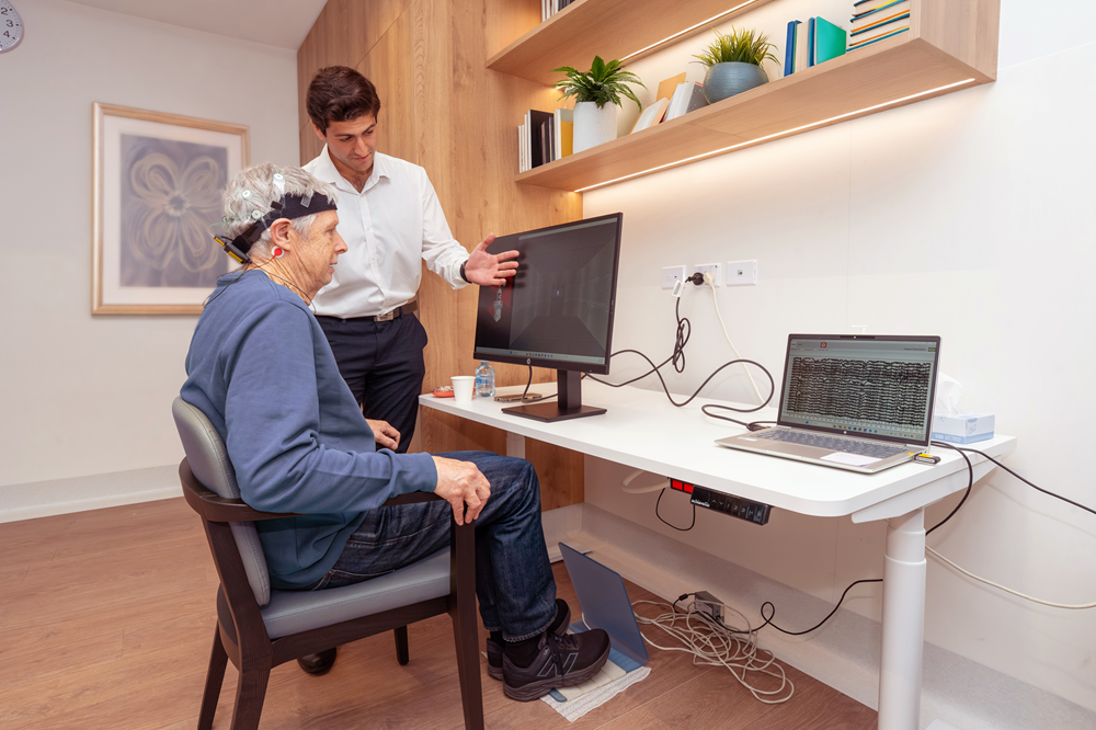 Patient being assessed by a physiotherapist in the new Brain Institute and Clinic
