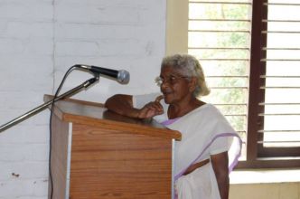 Mrs Karthiayani, a farmer, discussing the cultivation of traditional rice varieties.