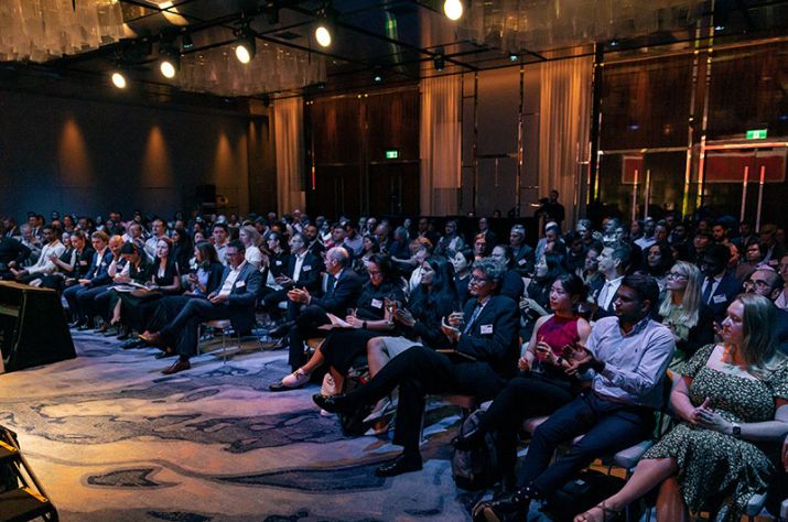 Crowded room at panel session 