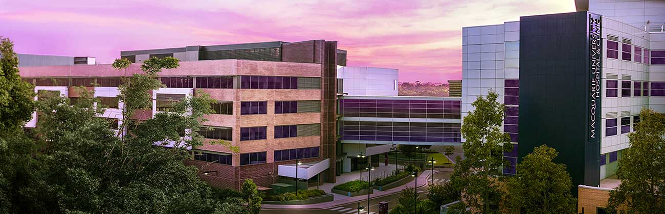 Sunset over MQ Health clinics and hospital buildings
