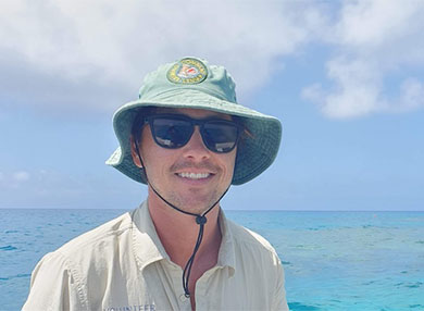 Photo of Dr Patrick Burke outside with ocean in background