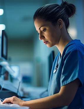 An AI-generated image of a medical professional typing on a laptop.