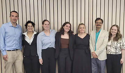 The B&HR Access to Justice team, seven researchers standing and smiling.