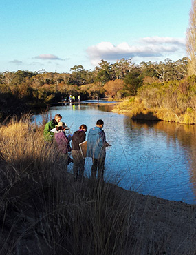 A group of people by a river