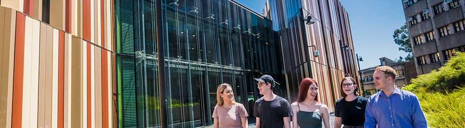 A group of students walking on campus