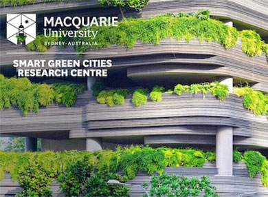 Futuristic concrete building with plants flowing over the wall