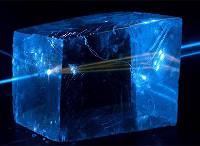 Blue light traveling through in calcite