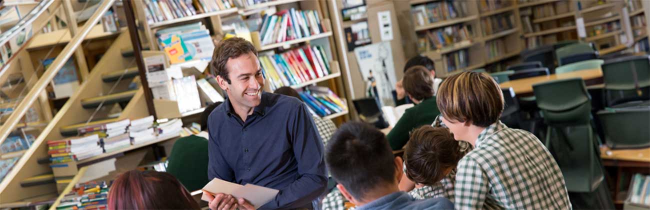 Teacher in classroom with students