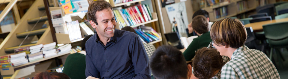 Teacher in classroom with students