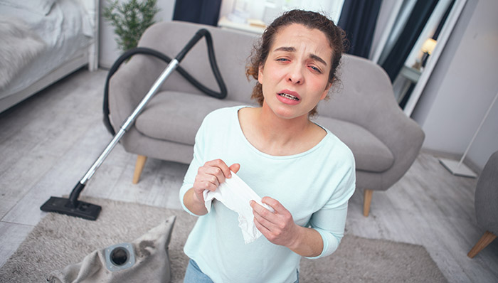 Woman sneezing