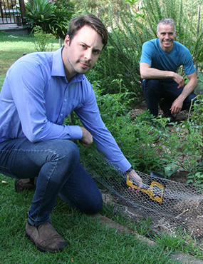 Two men in a garden