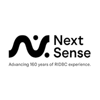 The logo for Next Sense, a thick curved black line that resembles the lower case initials 'n' and 's' with an extra dot on either side of the 's' so that it resembles a tilted division sign. Underneath are the words "Advancing 160 years of RIDBC experience."
