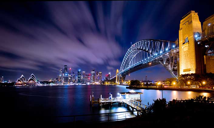 A view of Sydney Harbour and Bridge at twilight