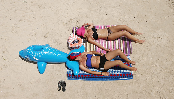 People sunbaking