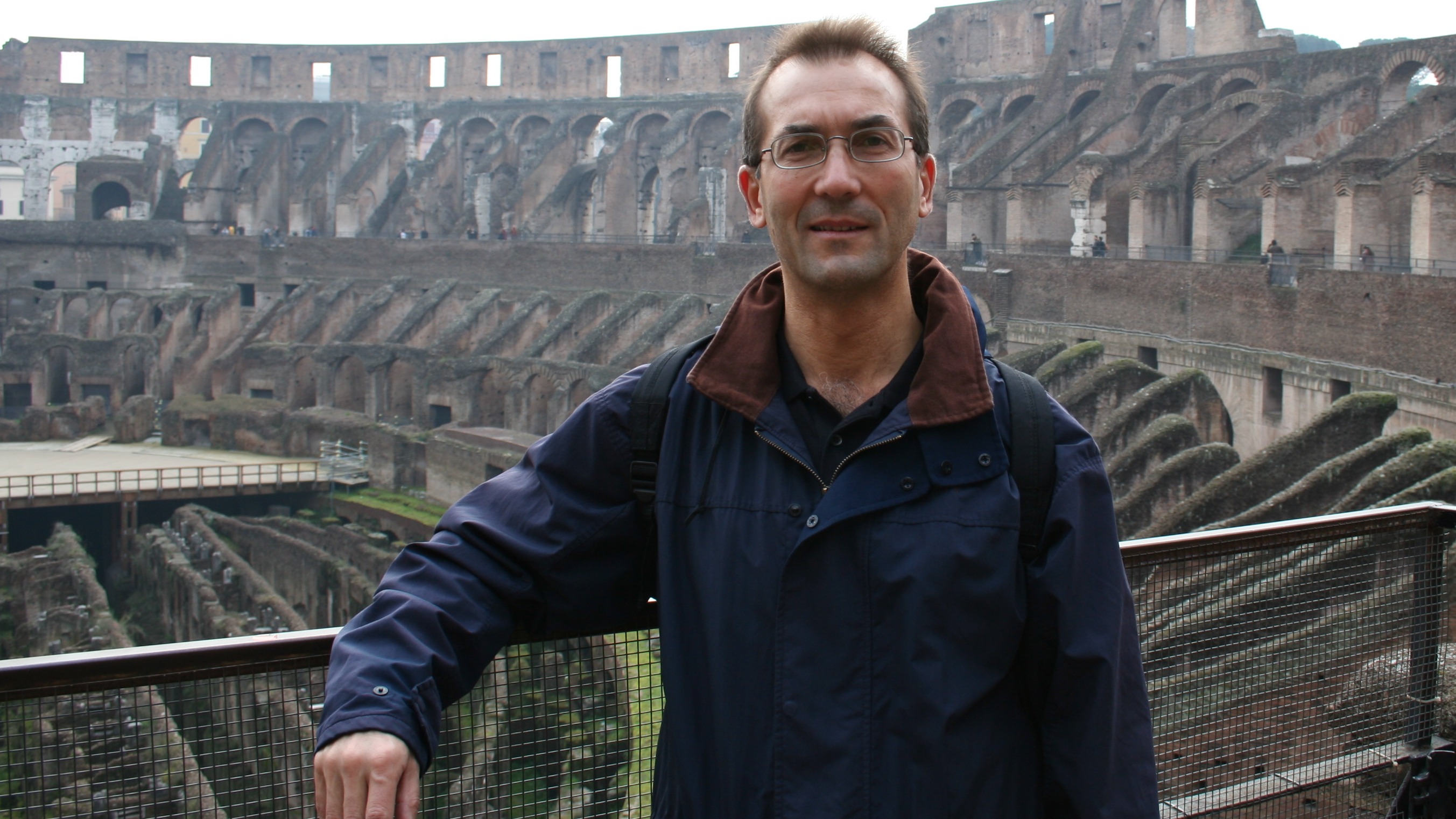 An image of Peter Keegan in front of some Roman archaeological remains
