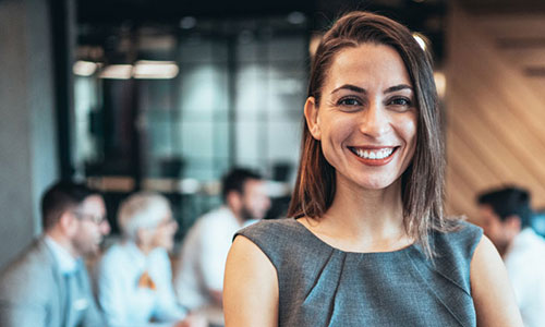 Female postgraduate student looking at the camera