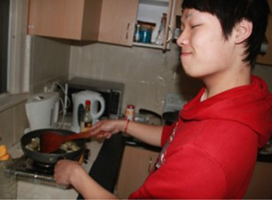 Hank cooking.