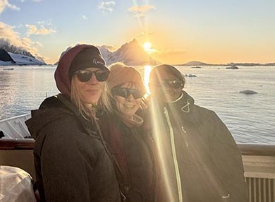 Photo of three scientists in Antarctica