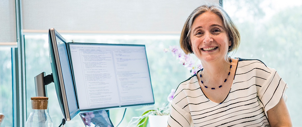 A woman sitting at a desk