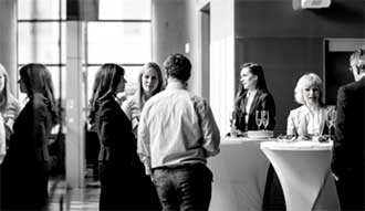 A group of people mingling at a function