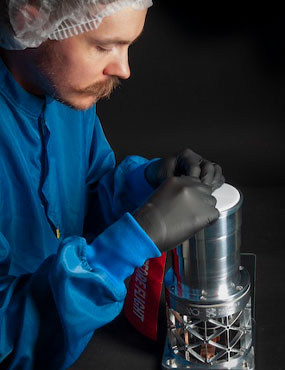 Mayla thermal camera getting set up by scientist with gloves