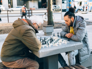 Men playing chess. Photo by Photo by AP x 90 on Unsplash 