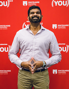 Prashan Karunaratne posing for a photo at an award shoot