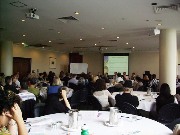 audience listening to the plenary panel discussion