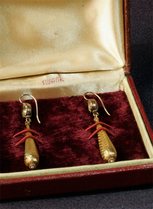 Earrings, displayed in box