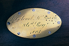 [engraved nameplate]