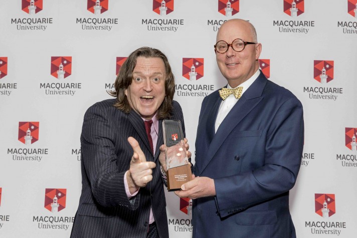 Dr Murray Cook receiving his alumni award from Vice-Chancellor Bruce S Dowton