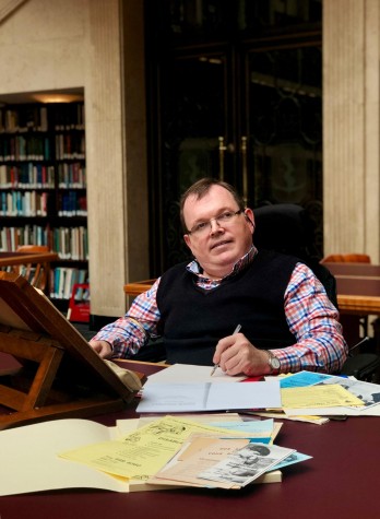 Adam Johnston researching his thesis - photo credit State Library of NSW