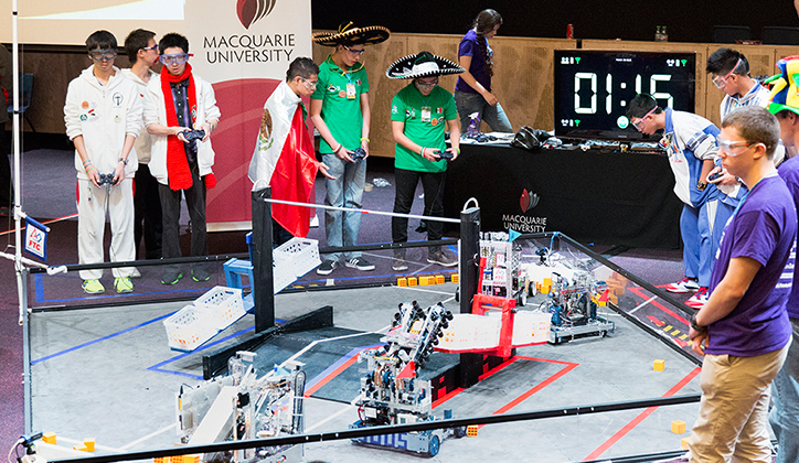  Teams programmed their robots and developed strategies to compete on a 4m x 4m field against each other. Photo: Chris Stacey