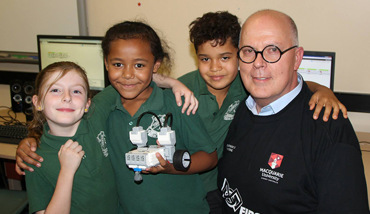  Professor S. Bruce Dowton with students from Ivanhoe Central.