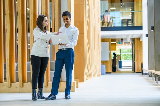 two-students-standing-in-arts-building-1399x892-jpg